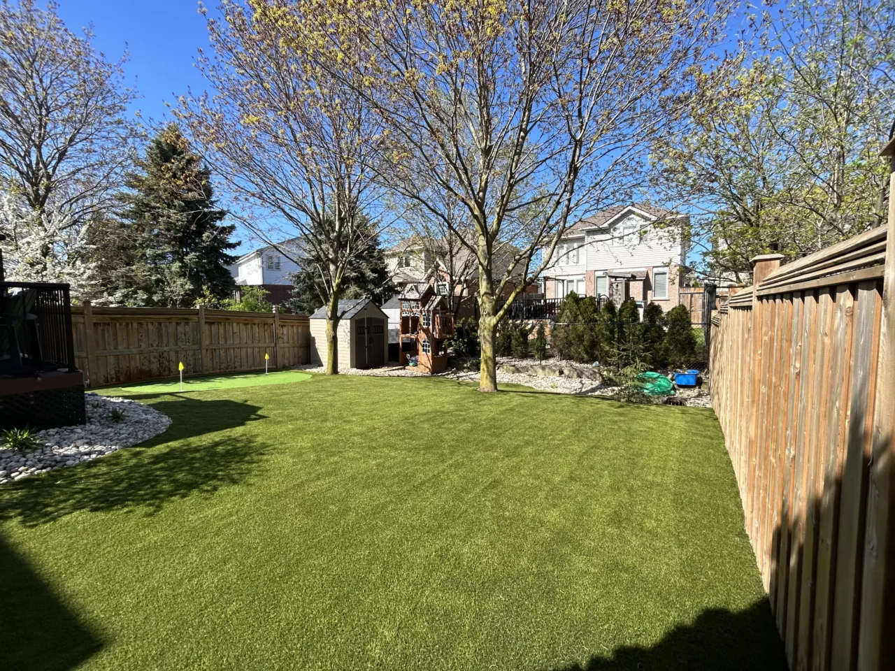 Artificial grass installed in an Ajax backyard