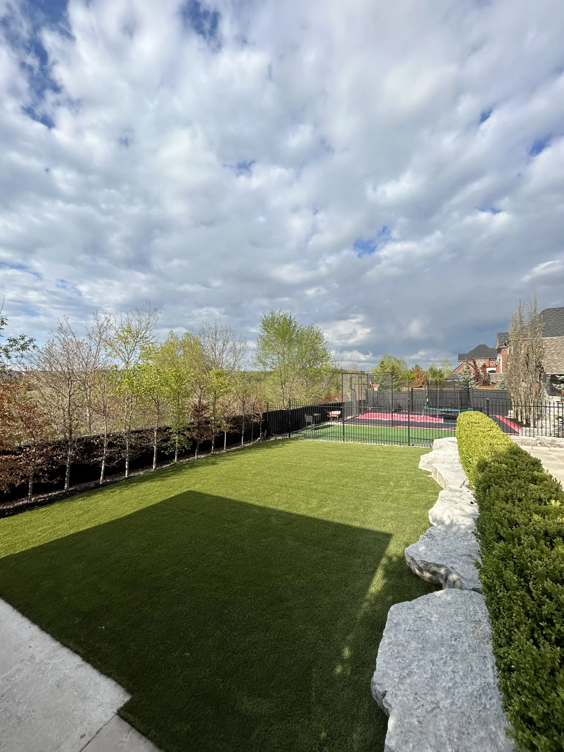 Backyard artificial grass installation in Ajax