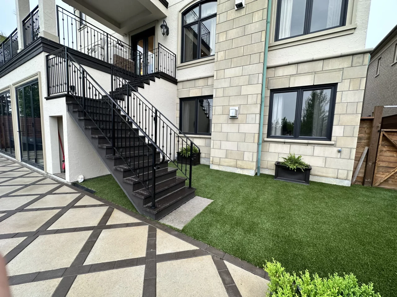 Finished artificial grass yard in Durham Region