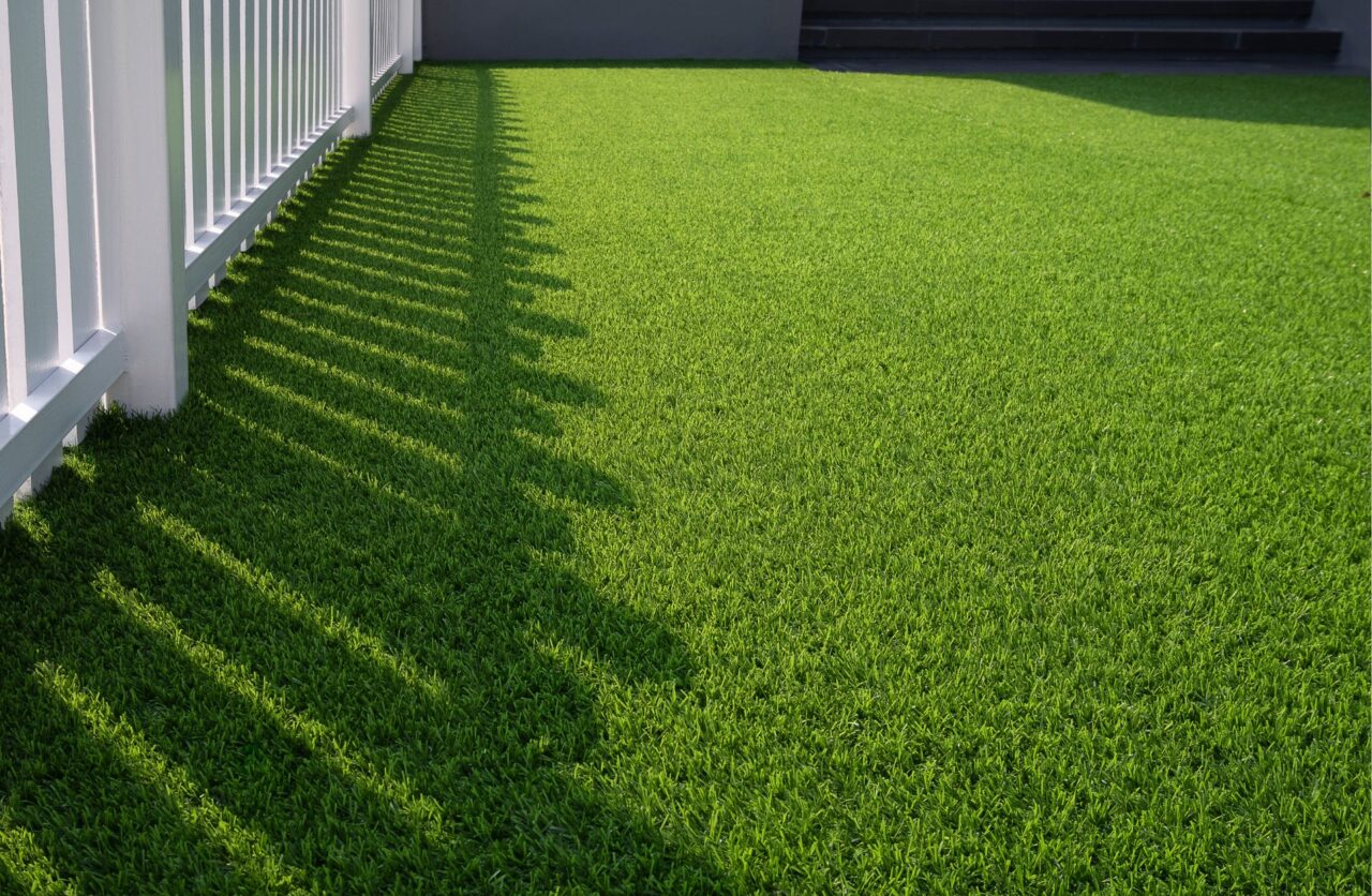 Artificial grass in a small fenced Ajax yard